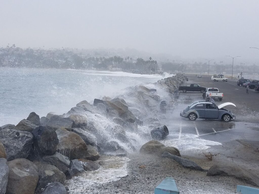 Waves breach sea wall Cabrillo Beach, San Pedro